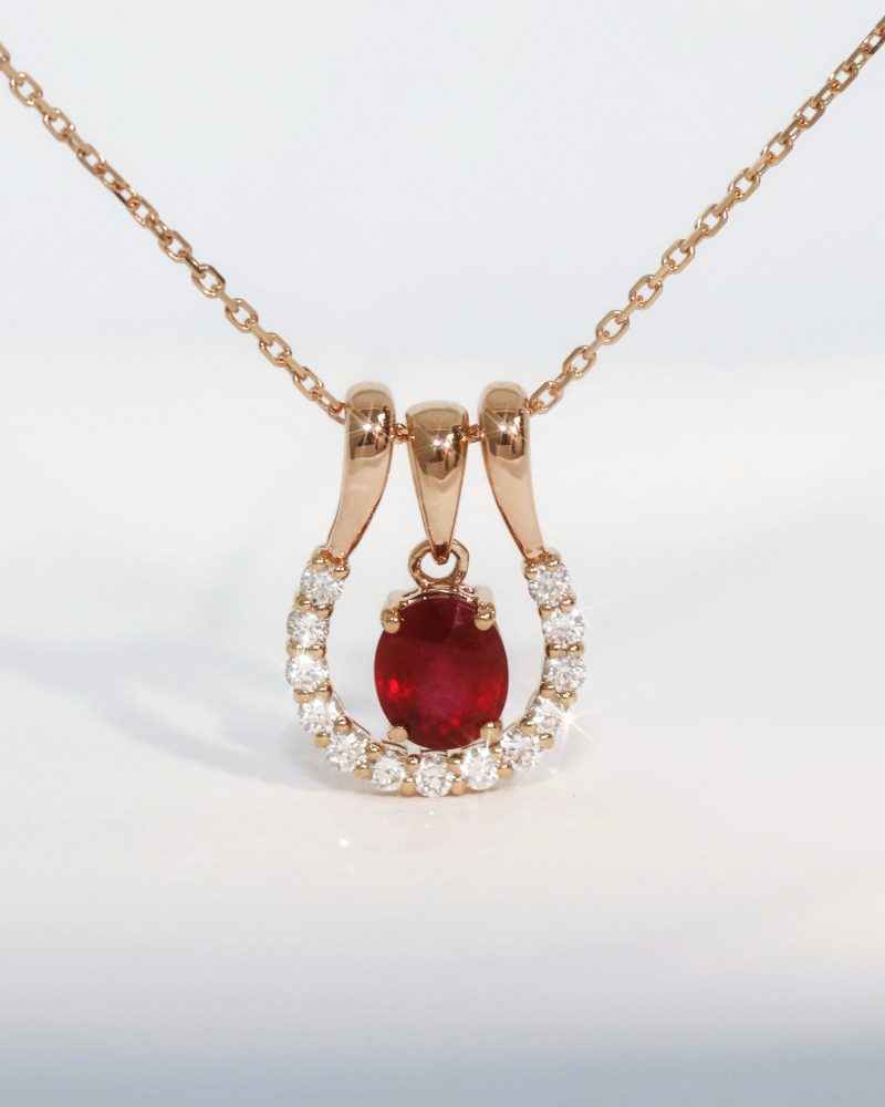 Oval cut Ruby Horseshoe Diamond Necklace